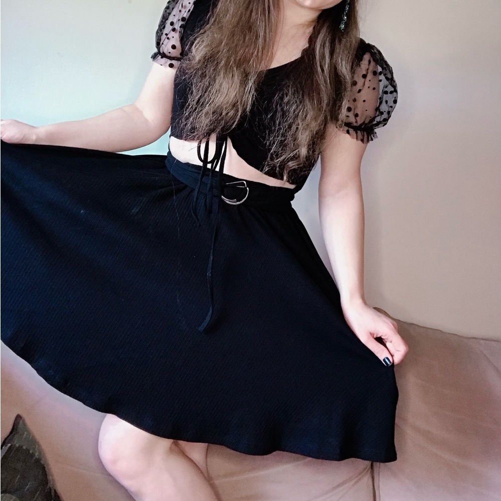 Elegant Black Dress with Sheer Polka Dot Sleeves - Picture 4 of 4